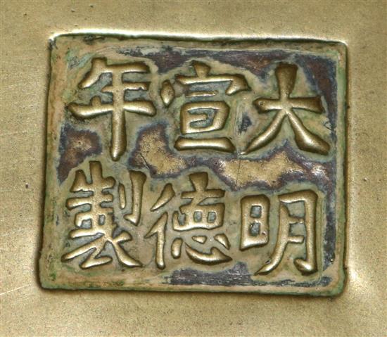 Two Chinese bronze censer stands, six character Xuande marks, 18th/19th century, diameter 16cm and 17cm